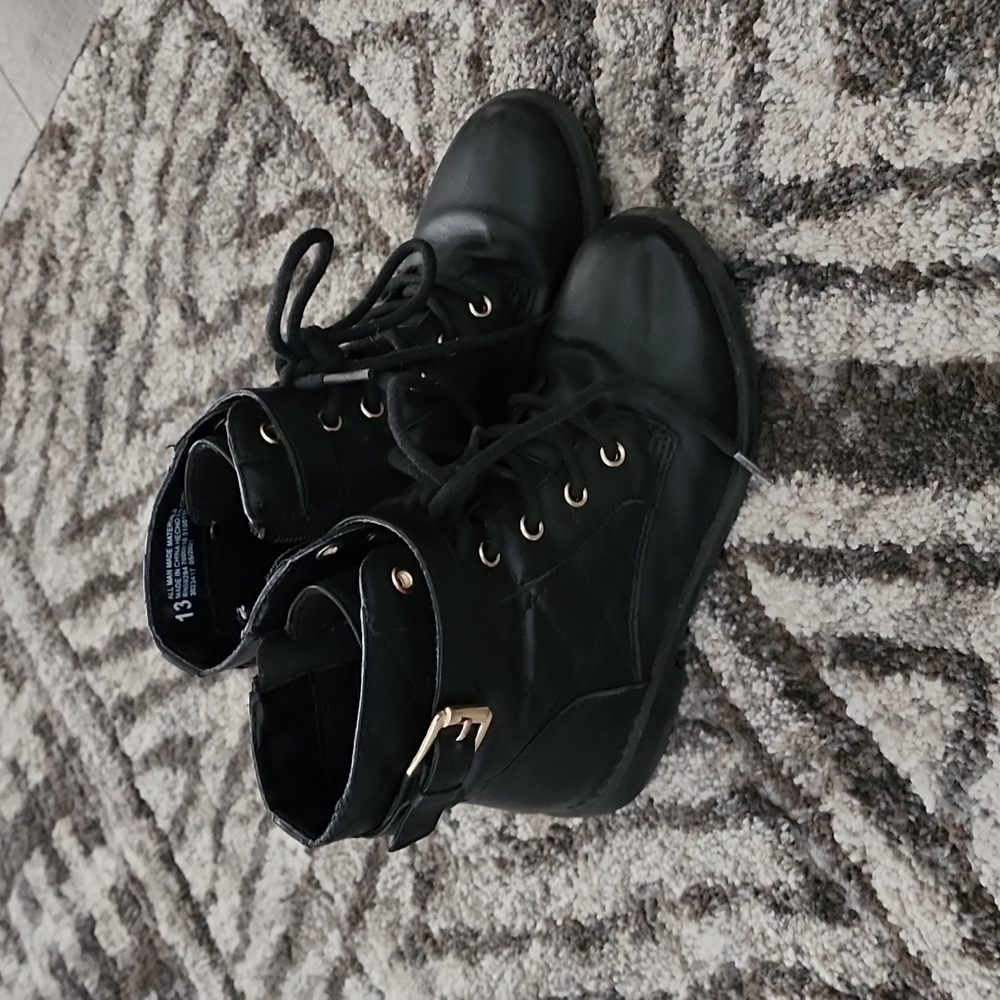 Little girl black boots with gold buckle
